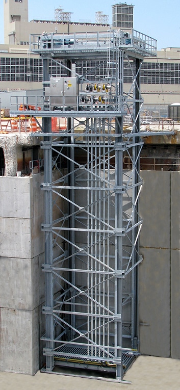 government facility uses a hydraulic vertical reciprocating conveyor to work in tight spaces