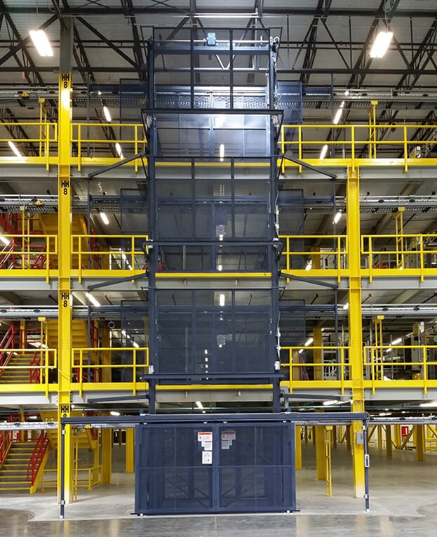 A PFlow Amazon M vertical reciprocating conveyor makes moving product between floors easy and safe.