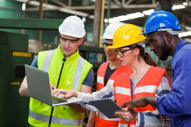 Warehouse employees participating in a safety meeting